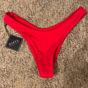 Brand new red bottoms with tags, size Medium